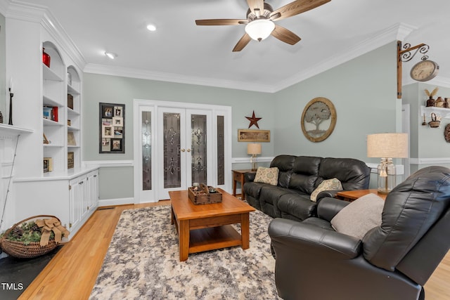 4027 Green Forest Ct, Rocky Mount, NC 27804 - living room with built in shelves, crown molding, light hardwood / wood-style flooring, and ceiling fan