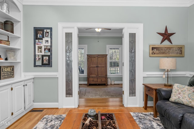 4027 Green Forest Ct, Rocky Mount, NC 27804 - living room with ceiling fan, light wood-type flooring, and ornamental molding