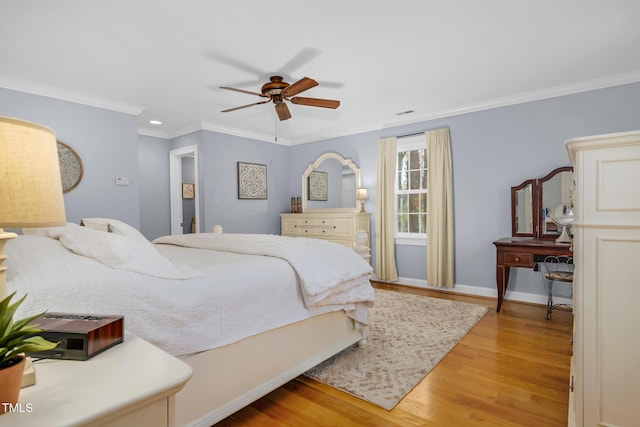 4027 Green Forest Ct, Rocky Mount, NC 27804 - bedroom with ceiling fan, crown molding, and light hardwood / wood-style flooring