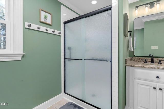 4027 Green Forest Ct, Rocky Mount, NC 27804 - bathroom featuring tile patterned flooring, vanity, a shower with shower door, and crown molding