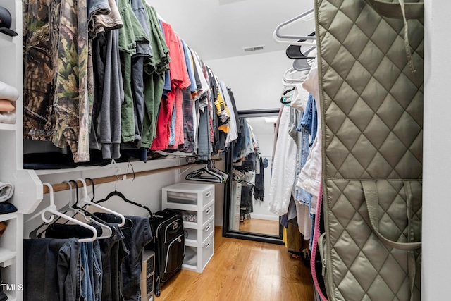 4027 Green Forest Ct, Rocky Mount, NC 27804 - walk in closet with wood-type flooring