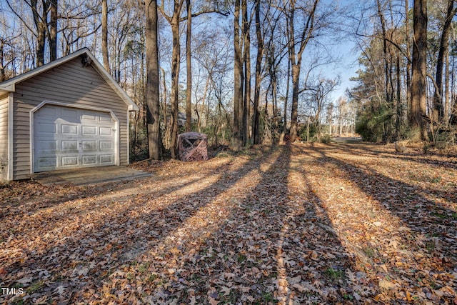 4027 Green Forest Ct, Rocky Mount, NC 27804 - view of yard with a garage and an outbuilding