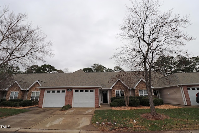 single story home featuring a garage