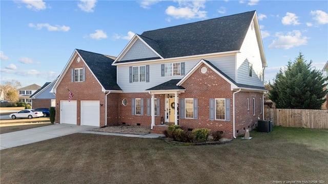 view of front property with a garage, a front lawn, and central air condition unit