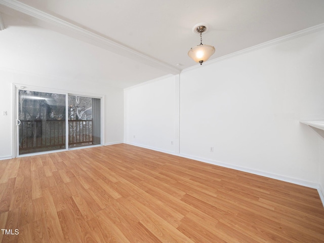 unfurnished living room featuring light hardwood / wood-style flooring and ornamental molding