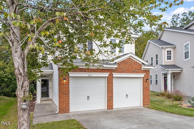 view of front of property featuring a garage