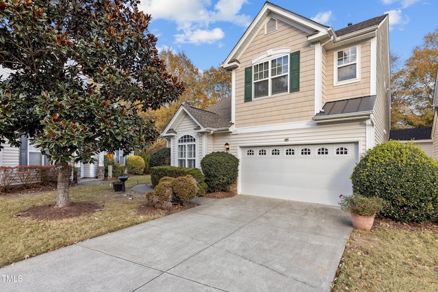 view of front of property with a garage