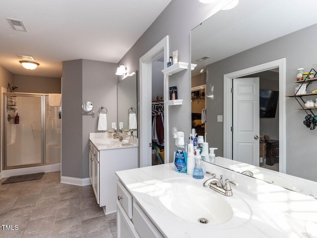 bathroom featuring vanity and walk in shower