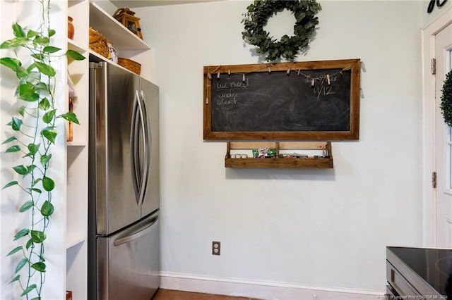 kitchen featuring stainless steel refrigerator