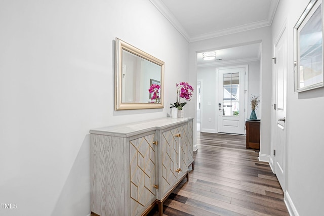 interior space featuring dark hardwood / wood-style floors and ornamental molding