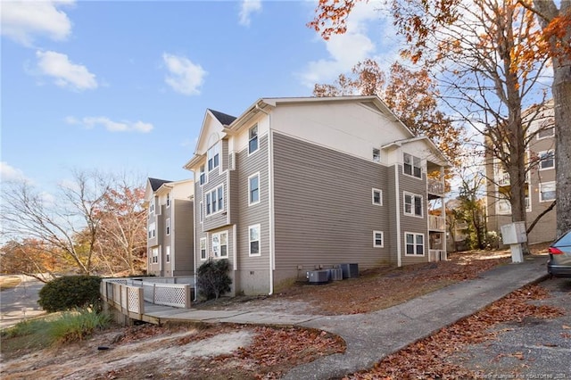 view of home's exterior with cooling unit