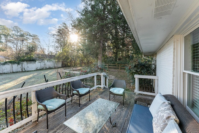 deck featuring an outdoor living space