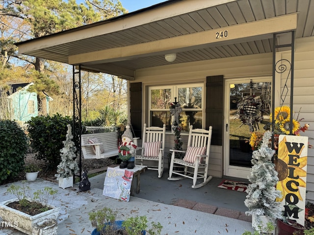 view of patio featuring covered porch