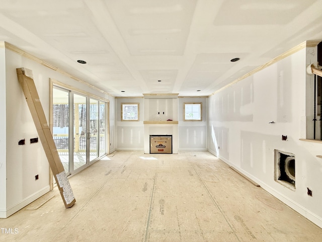 unfurnished living room with french doors and a fireplace