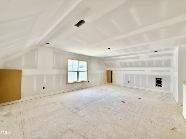 bonus room featuring vaulted ceiling