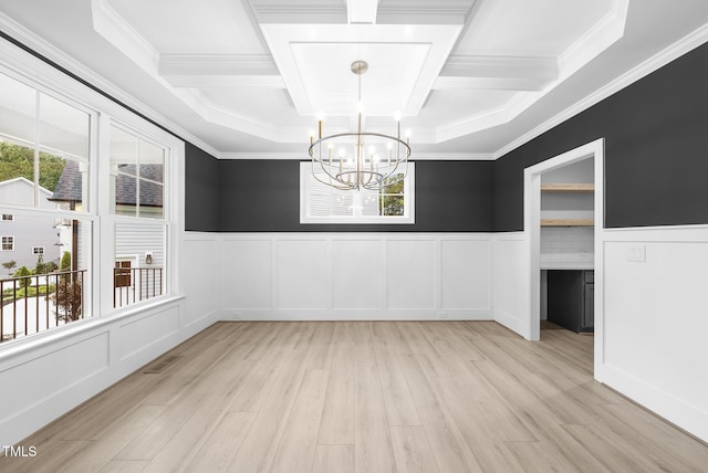 2625 Silver Gate Ct, Wake Forest, NC 27587 - unfurnished dining area with coffered ceiling, healthy amount of natural light, light wood-style flooring, a chandelier, and a decorative wall