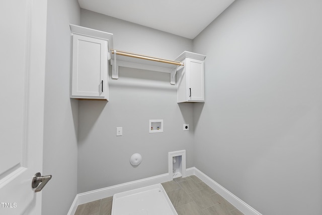2625 Silver Gate Ct, Wake Forest, NC 27587 - washroom with electric dryer hookup, gas dryer hookup, washer hookup, and cabinet space