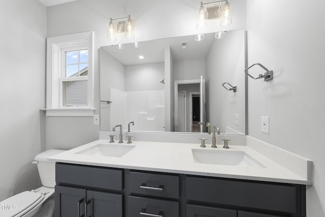 2625 Silver Gate Ct, Wake Forest, NC 27587 - bathroom featuring double vanity and a shower