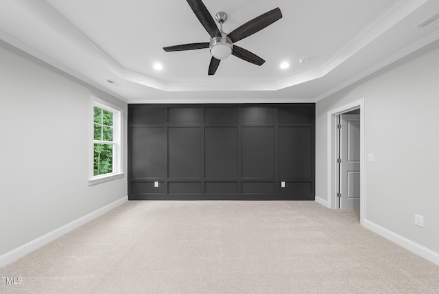 2625 Silver Gate Ct, Wake Forest, NC 27587 - unfurnished bedroom featuring a tray ceiling, crown molding, light colored carpet, recessed lighting, and a ceiling fan