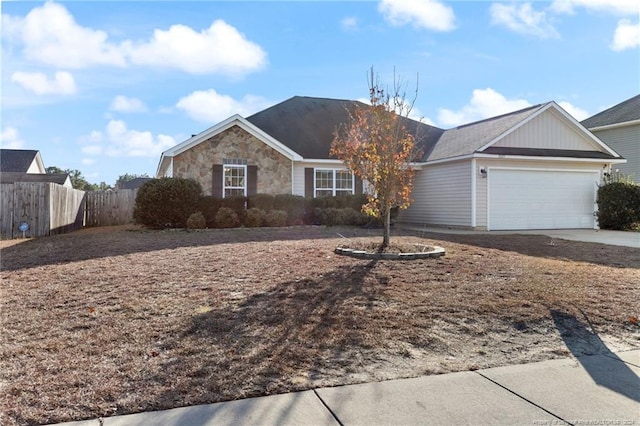 ranch-style house featuring a garage