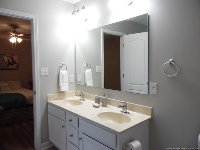 bathroom with vanity and ceiling fan