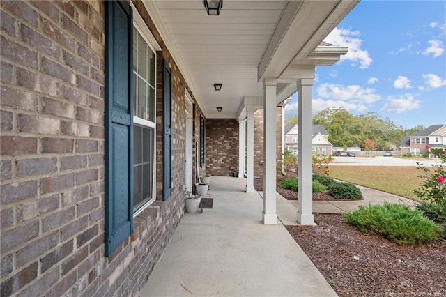 view of patio featuring a porch