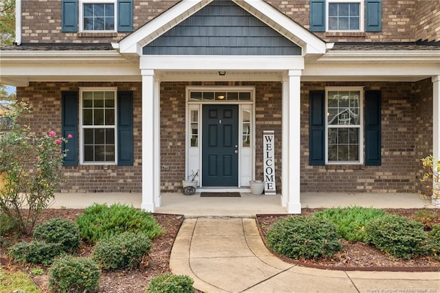 property entrance with covered porch