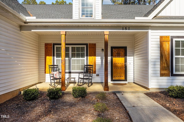 doorway to property featuring a porch