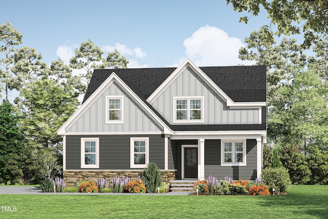 view of front of house featuring a front yard, stone siding, board and batten siding, and roof with shingles