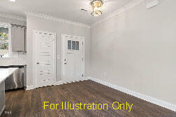 interior space featuring crown molding and dark hardwood / wood-style floors