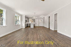 unfurnished living room featuring ornamental molding and dark hardwood / wood-style floors