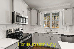 kitchen with sink, decorative backsplash, and stainless steel appliances