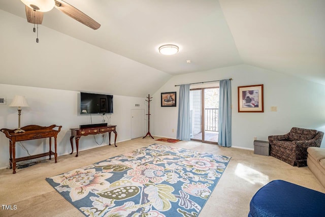 interior space with lofted ceiling and ceiling fan