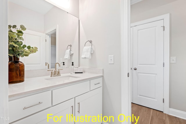 bathroom with vanity and hardwood / wood-style floors