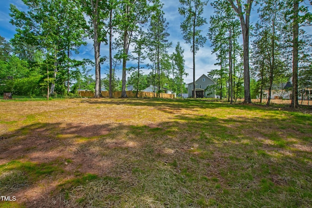 view of yard with fence