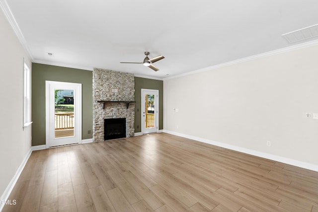 unfurnished living room featuring crown molding, a ceiling fan, and light wood finished floors