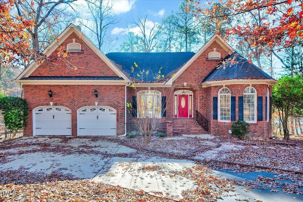 view of front of property with a garage