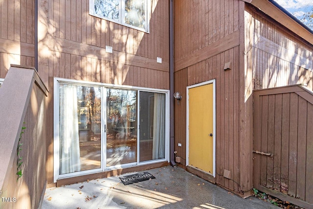 entrance to property featuring a patio area