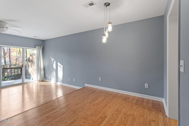 interior space with light hardwood / wood-style flooring and ceiling fan