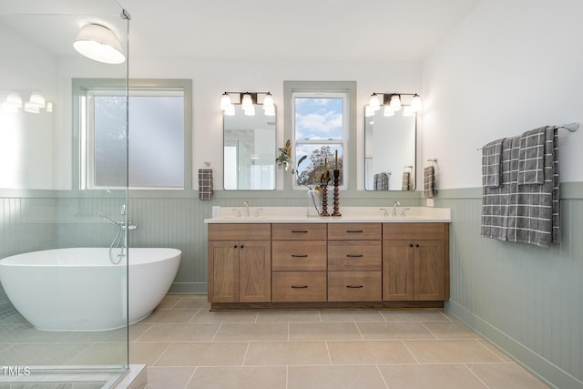 bathroom featuring tile patterned flooring, vanity, and independent shower and bath