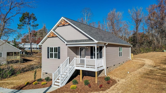 view of front of home featuring covered porch