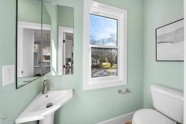 bathroom with sink and toilet