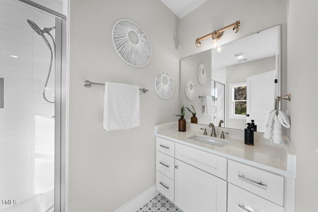 bathroom featuring vanity and walk in shower