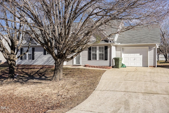 view of front facade with an attached garage and driveway