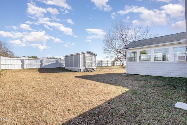 view of yard with a storage unit