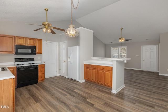 kitchen with range with gas cooktop, white refrigerator with ice dispenser, kitchen peninsula, lofted ceiling, and ceiling fan with notable chandelier