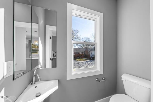 bathroom with sink and toilet