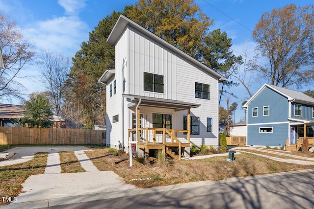 modern farmhouse style home with a porch