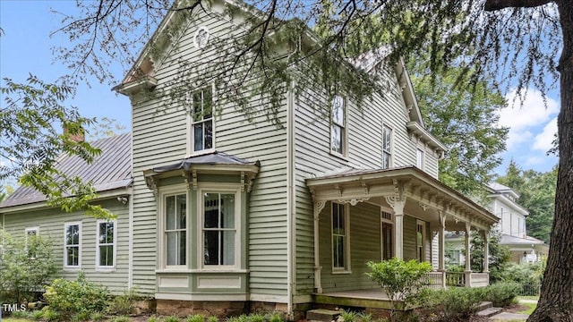 view of home's exterior featuring covered porch