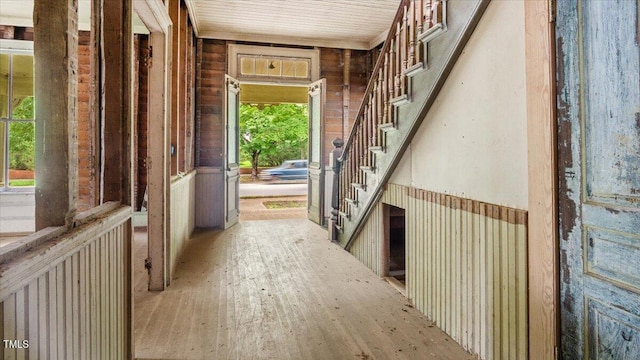 hallway with wood-type flooring